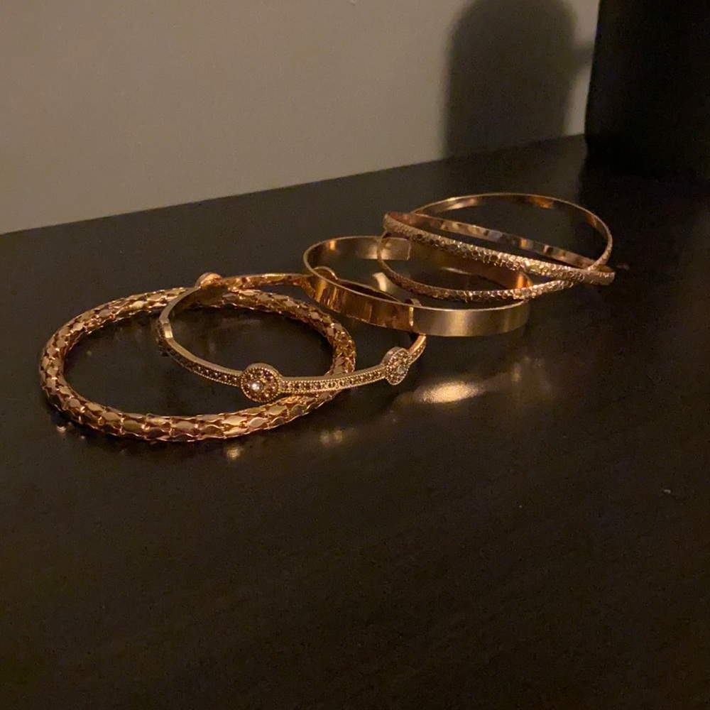 Stacked rose gold bangle bracelets